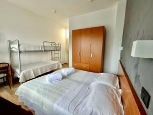Postel nebo postele na pokoji v ubytování Hotel Il Moro + 18 fotografií