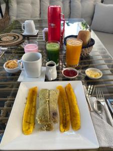 אפשרויות ארוחת הבוקר המוצעות לאורחים ב-Hotel Rupa Rupa