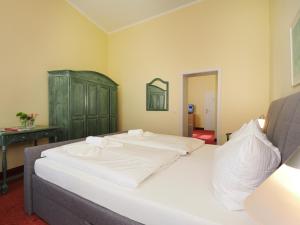 Postel nebo postele na pokoji v ubytování Hotel See-Eck