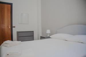 Postel nebo postele na pokoji v ubytování Don Giovanni a Toledo Apartment + 18 fotografií