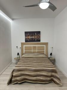 Postel nebo postele na pokoji v ubytování Apartamento blanco y negro en el centro