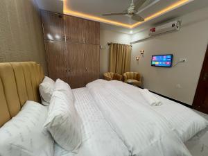 Postel nebo postele na pokoji v ubytování Airway Guest house + 8 fotografií