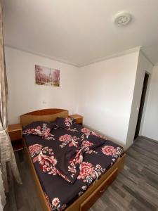 Postel nebo postele na pokoji v ubytování Casa Tomița