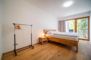 Postel nebo postele na pokoji v ubytování Lipno Port Apartment C203 - Lipno Home