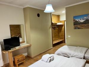 TV a/nebo společenská místnost v ubytování Hotel Bacelli Voskopoje