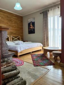 Postel nebo postele na pokoji v ubytování Hotel Bacelli Voskopoje