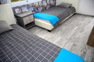 מיטה או מיטות בחדר ב-Demetris apartment