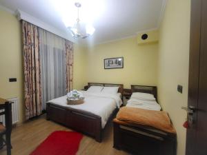 Postel nebo postele na pokoji v ubytování Vila118 + 37 fotografií