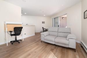 a living room with a couch and a chair at Bright, Newly Remodeled 1BR in PA Second Downtown in Palo Alto