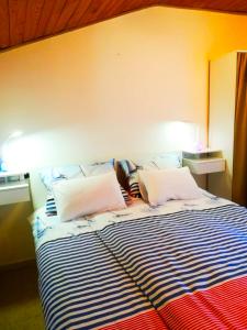 Postel nebo postele na pokoji v ubytování Felix Apartment Biograd