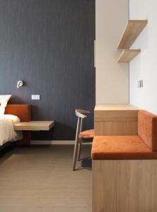Postel nebo postele na pokoji v ubytování Hôtel Les Fines Gueules + 3 fotografie