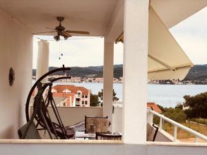 a view of the water from the balcony of a house at Apartments Jadra in Kučište