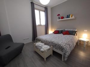 Postel nebo postele na pokoji v ubytování Lisa Apartment Tor Vergata