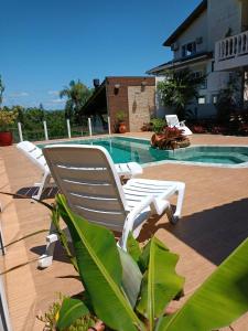 Piscina de la sau aproape de House Flat Cacupé em Florianópolis