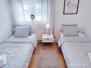 Postel nebo postele na pokoji v ubytování Lumani Apartment Zagreb with FREE Parking
