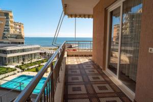 a balcony with a view of the ocean at BluApartments 3,Shëngjin Seaview in Shëngjin