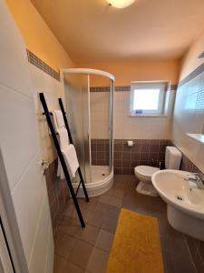 Ein Badezimmer in der Unterkunft Villa HAUS NIKO