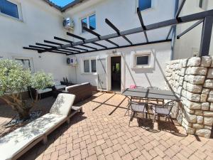 Ein Balkon oder eine Terrasse in der Unterkunft Villa HAUS NIKO