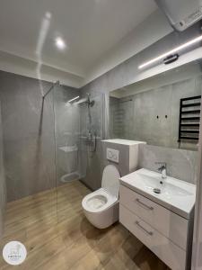 Ένα μπάνιο στο Apartamenty studio Parkowa 17 Darłówko - Przy plaży