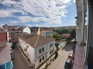 a view of a city street from a building at Просторен и добре обзаведен апартамент Oborishte 39 str in Plovdiv