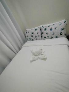 Ένα ή περισσότερα κρεβάτια σε δωμάτιο στο Cozy 642 shore3 residence tower2 near MOA