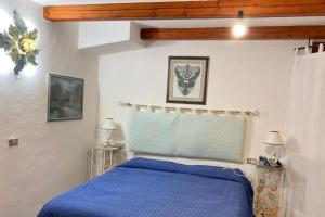 Letto o letti in una camera di ISS Travel, Panoramic Coda Cavallo Cottages - 10 km from San Teodoro