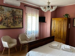 Postel nebo postele na pokoji v ubytování B&B Casa del Conte