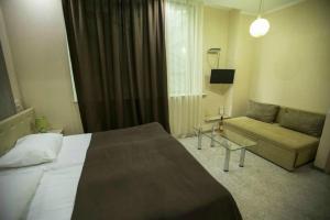 Voodi või voodid majutusasutuse Tbiliseli Inn toas