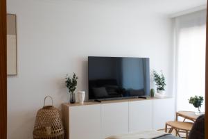 Una televisión o centro de entretenimiento en Progreso Sanxenxo