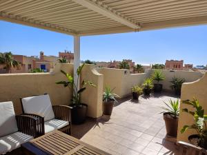 A balcony or terrace at Attic apartment in Vera Beach with wifi and air-conditioning