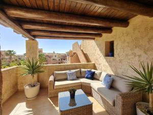 A seating area at Attic apartment in Vera Beach with wifi and air-conditioning