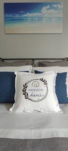 A bed or beds in a room at CAPERCIA home
