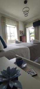 A bed or beds in a room at CAPERCIA home