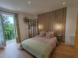 Ένα ή περισσότερα κρεβάτια σε δωμάτιο στο Gîte casa di l'Apa