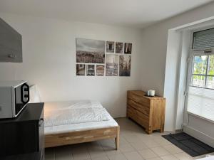Postel nebo postele na pokoji v ubytování Seepanorama an der Esplanade 1