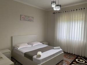 Ένα ή περισσότερα κρεβάτια σε δωμάτιο στο The Hideaway Guesthouse