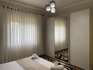 Ένα ή περισσότερα κρεβάτια σε δωμάτιο στο The Hideaway Guesthouse