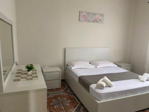 Ένα ή περισσότερα κρεβάτια σε δωμάτιο στο The Hideaway Guesthouse