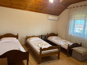 Ένα ή περισσότερα κρεβάτια σε δωμάτιο στο The Hideaway Guesthouse