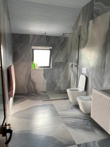 Ένα μπάνιο στο The Hideaway Guesthouse