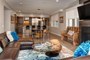 a living room with a couch and a table at Rio Grande 203 & 204 condo in Park City