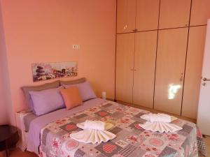เตียงในห้องที่ Delphitea Philoxenia