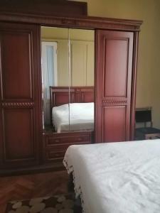 A bed or beds in a room at Vakho house