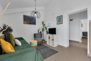 TV a/nebo společenská místnost v ubytování Apartmani Vanda