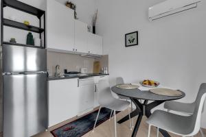Kuchyň nebo kuchyňský kout v ubytování Apartmani Vanda
