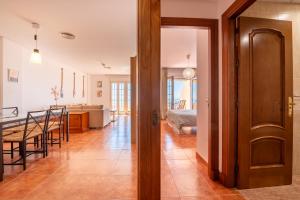 a hallway with a dining room and a living room at Aguadulce Vista Mar in Aguadulce