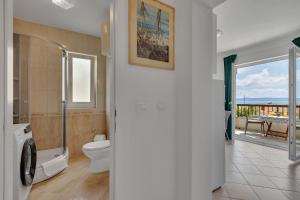 Koupelna v ubytování Apartmani Vanda + 37 fotografií
