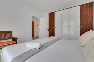 Postel nebo postele na pokoji v ubytování Apartmani Vanda