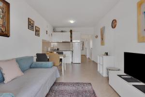 Kuchyň nebo kuchyňský kout v ubytování Apartmani Vanda