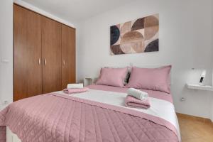 Postel nebo postele na pokoji v ubytování Apartmani Vanda